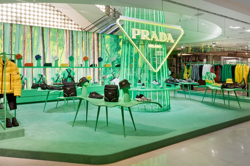 Prada Takes Over Galeries Lafayette Hyper Leaves Retail Installation paris fall winter 2020 collection footwear nature tropical neon green signs