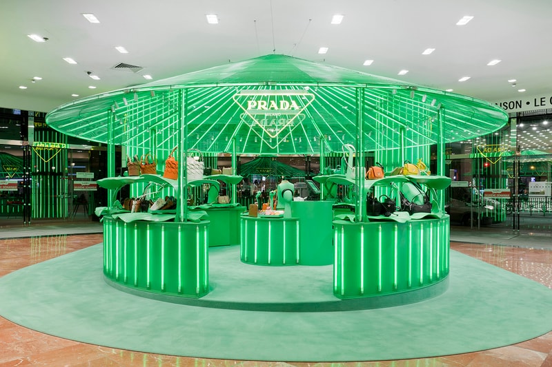 Prada Takes Over Galeries Lafayette Hyper Leaves Retail Installation paris fall winter 2020 collection footwear nature tropical neon green signs