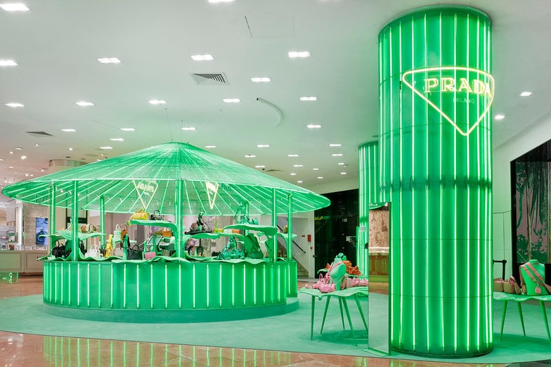 Prada Takes Over Galeries Lafayette Hyper Leaves Retail Installation paris fall winter 2020 collection footwear nature tropical neon green signs