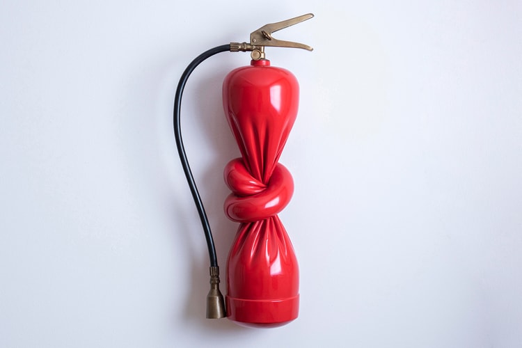 Alex Chinneck Transforms Fire Extinguisher Into Surreal Sculpture