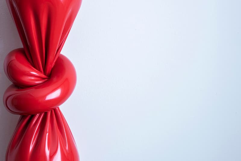 Alex Chinneck Twisted Fire Extinguisher Sculpture Knot Red Painted Patinated Waxed Bronze