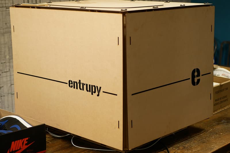 Entrupy Sneaker Authentication System Launch authentic counterfeit unidentified tech lvmh handbag data-driven artificial intelligence app ipod camera sensor box industry fake factory size tag analyze