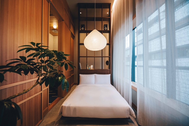 K5 Hotel Tokyo Claesson Koivisto Rune Former Bank Plants Wood Paper Lamps Maruni Emeco Furniture Red Couch Curtains Restaurant 