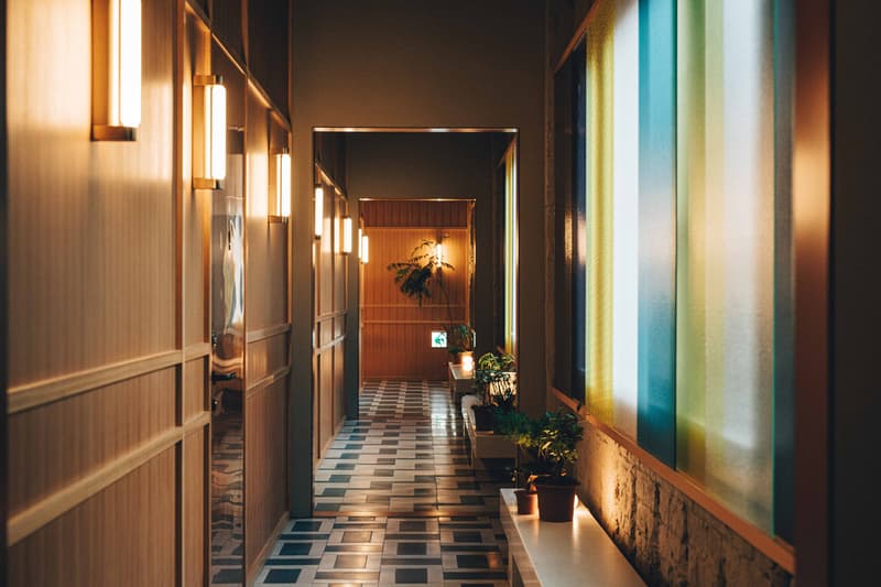 K5 Hotel Tokyo Claesson Koivisto Rune Former Bank Plants Wood Paper Lamps Maruni Emeco Furniture Red Couch Curtains Restaurant