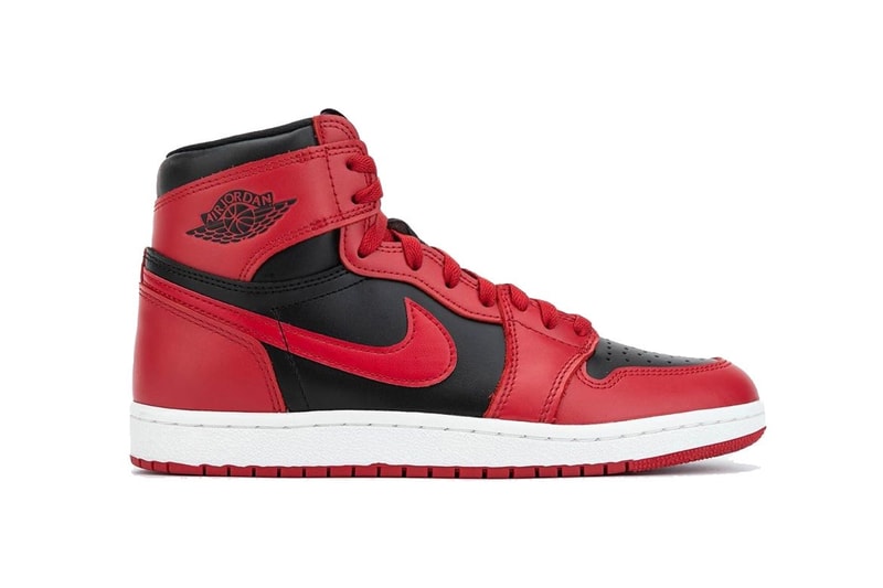 flip of the OG "Banned/Bred" Air Jordan Michael Jordan's first signature shoe sail midsole and red outsole Jumpman logo hangtag