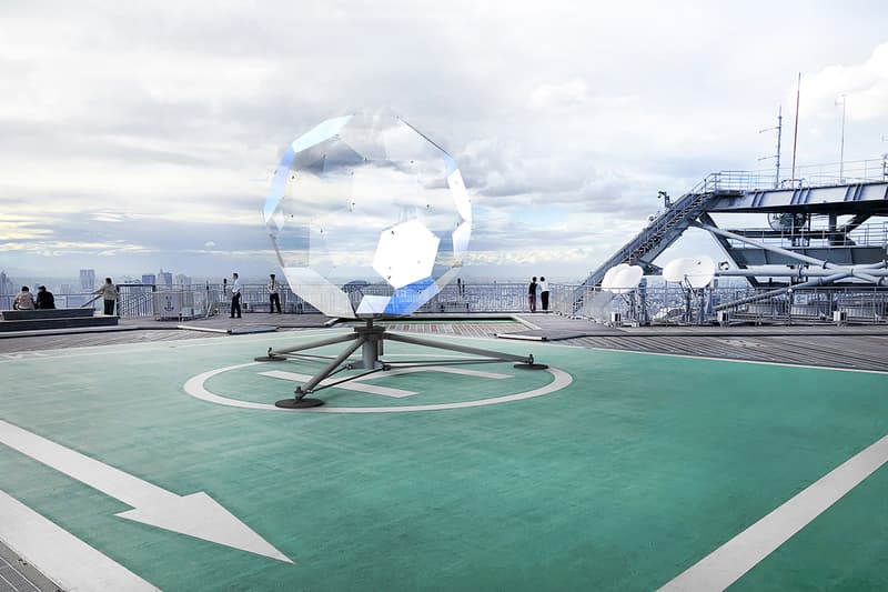 Vincent Leroy Illusion Lens Installation tokyo rooftop large scale sculpture Roppongi Hills Mori Tower helicopter landing helipad transportation geode kaleidoscope