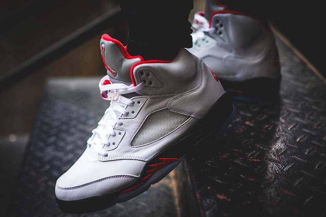 fire red 5s on feet
