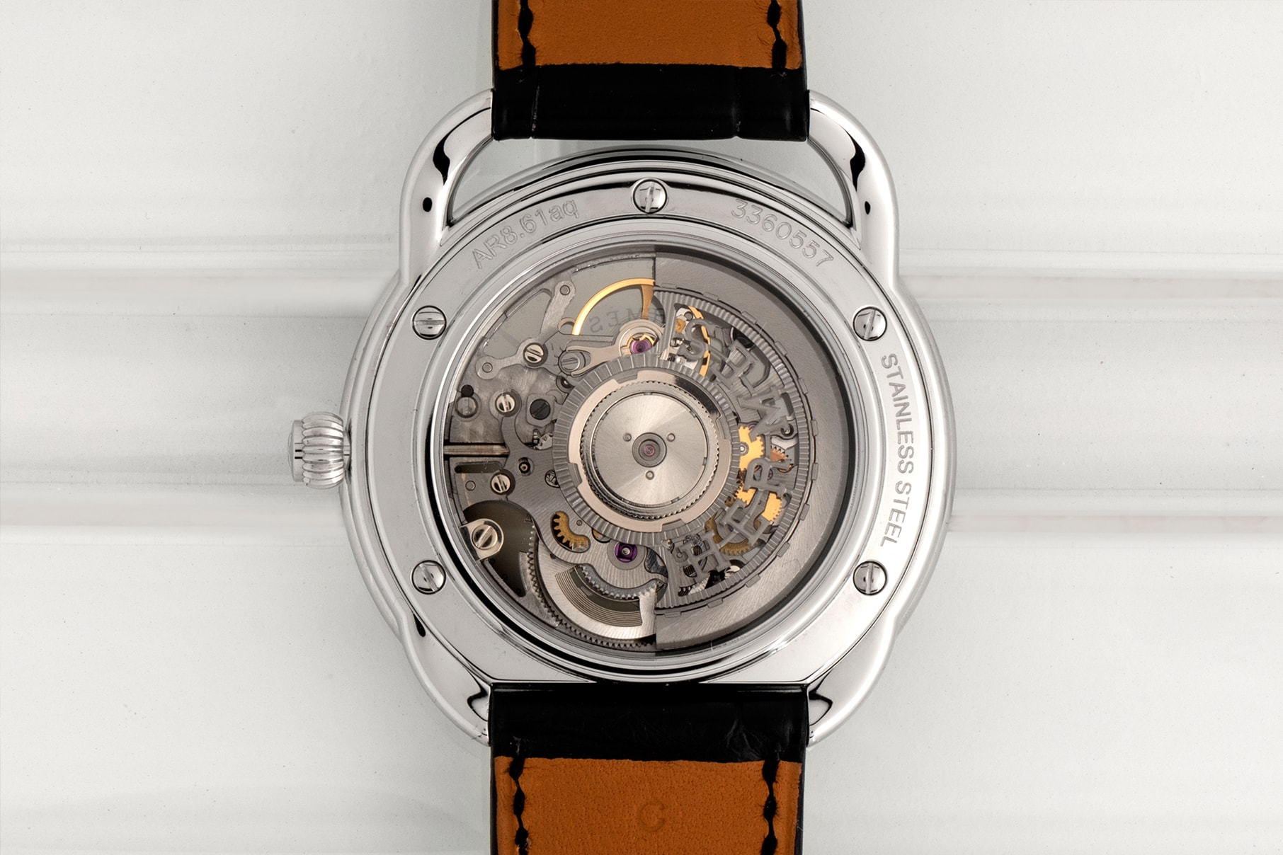 Hermès arceau squelette smoked sapphire crystal dial skeleton skeletonized movement watches accessories 