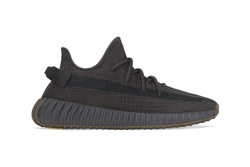 StockX YEEZY 350 V2 "Cinder" Release monochromatic color palette popping bright yellow heel pod charocal-colored Primeknit upper woven post-dyed monofilament side stripe weaved laces interior lining textile trim heel tab full-length BOOST midsole paired with a brown rubber sole unit