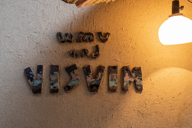 Take a Look Inside WMV Visvim's Tokyo Flagship interior storefront kelsi nakamura womens line womenswear arai-dashi ganpishi paper Echizen washi Katazurizome dyeing takehogaki fences zen buddhism design