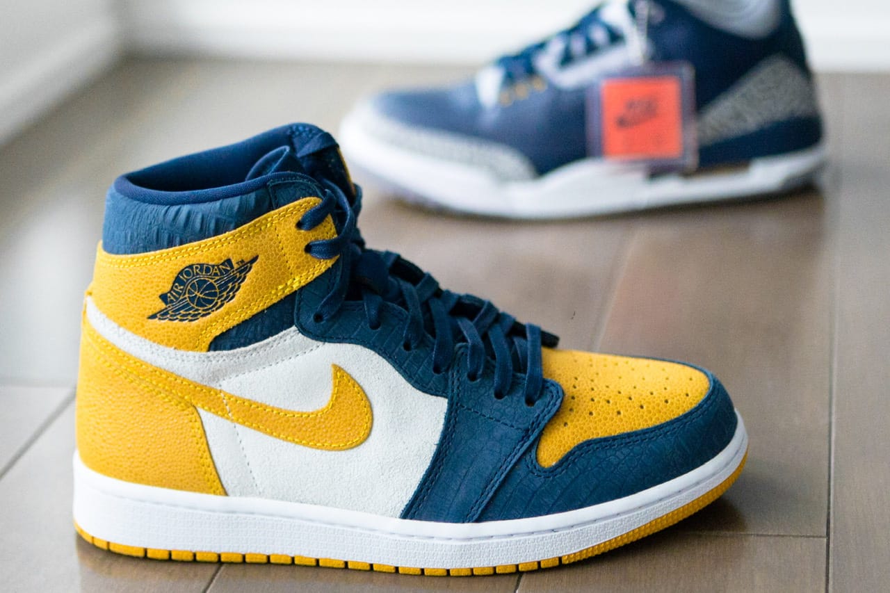 yellow and navy blue jordans