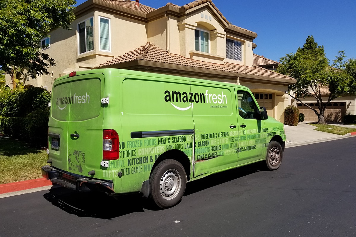 amazon fresh whole foods market stores grocery groceries delivery employees workforce demand waitlist 