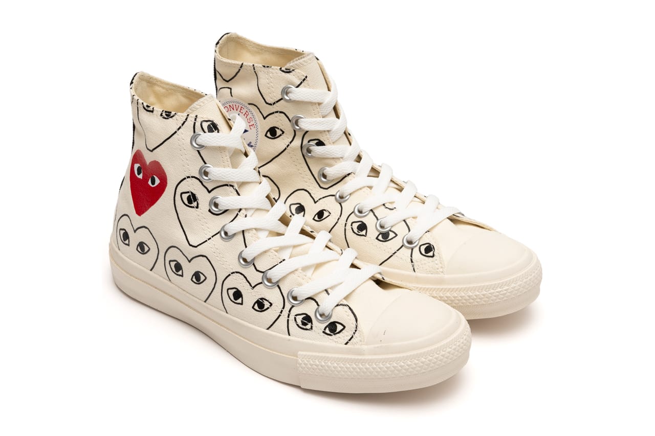 white converse with the heart