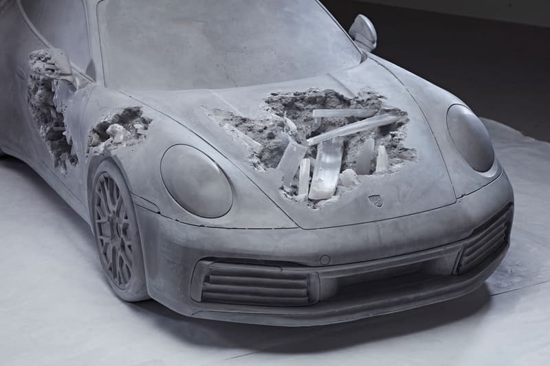 Daniel Arsham Eroded Porsche Phillips Hong Kong Auction K11 MUSEA 'Ash & Pyrite Eroded Porsche' Volcanic Ash Gray Opera Theater Exclusive Look