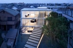 A Massive Stairway Cuts Through Minimalist House in Tokyo
