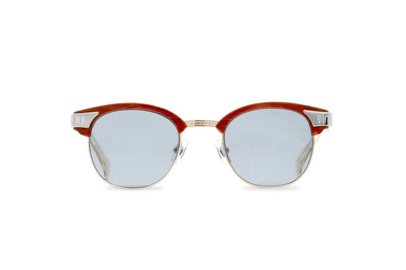 gucci shades with butterfly in the middle