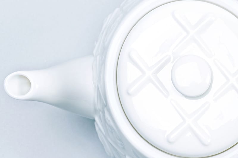 KAWS Teams up With AllRightsReserved on "XX" Monogram Teapot