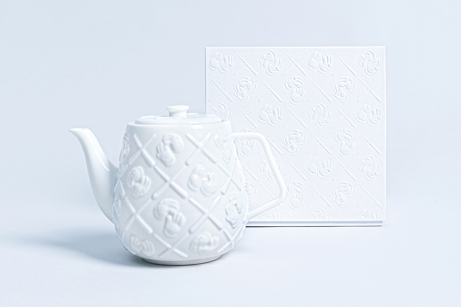 KAWS XX gloved hands Monogram Teapot AllRightsReserved collaboration ceramic white brew infusion
