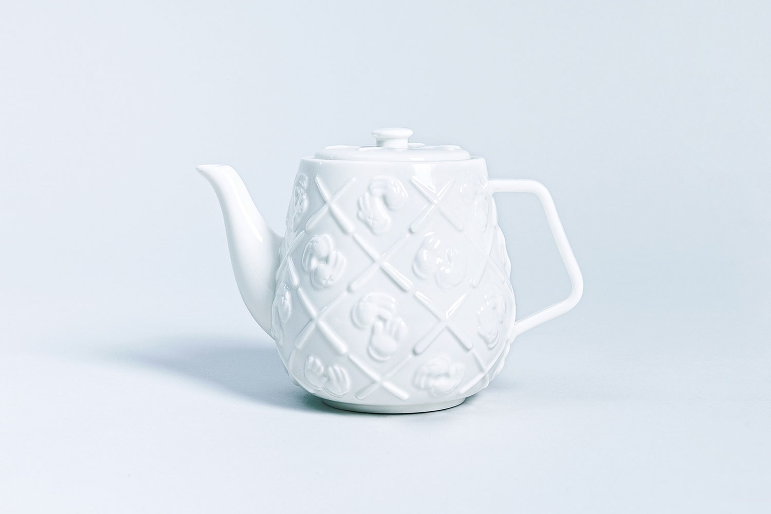 KAWS XX gloved hands Monogram Teapot AllRightsReserved collaboration ceramic white brew infusion