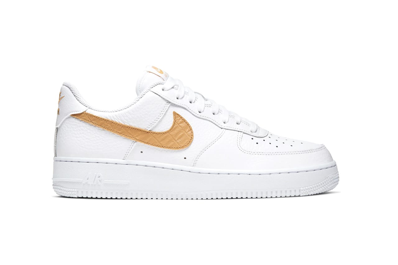 gold and white air force ones