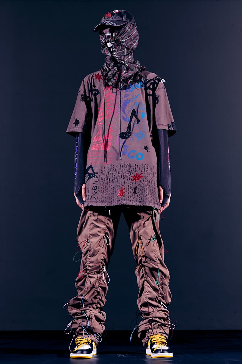 99%IS- "ATT1&TUDE" 15th Collection Lookbook diy maximalism Punk riot gear gobchang pants down puffer jackets glow in the dark reflective inks screenprint bajowoo south korean brand 