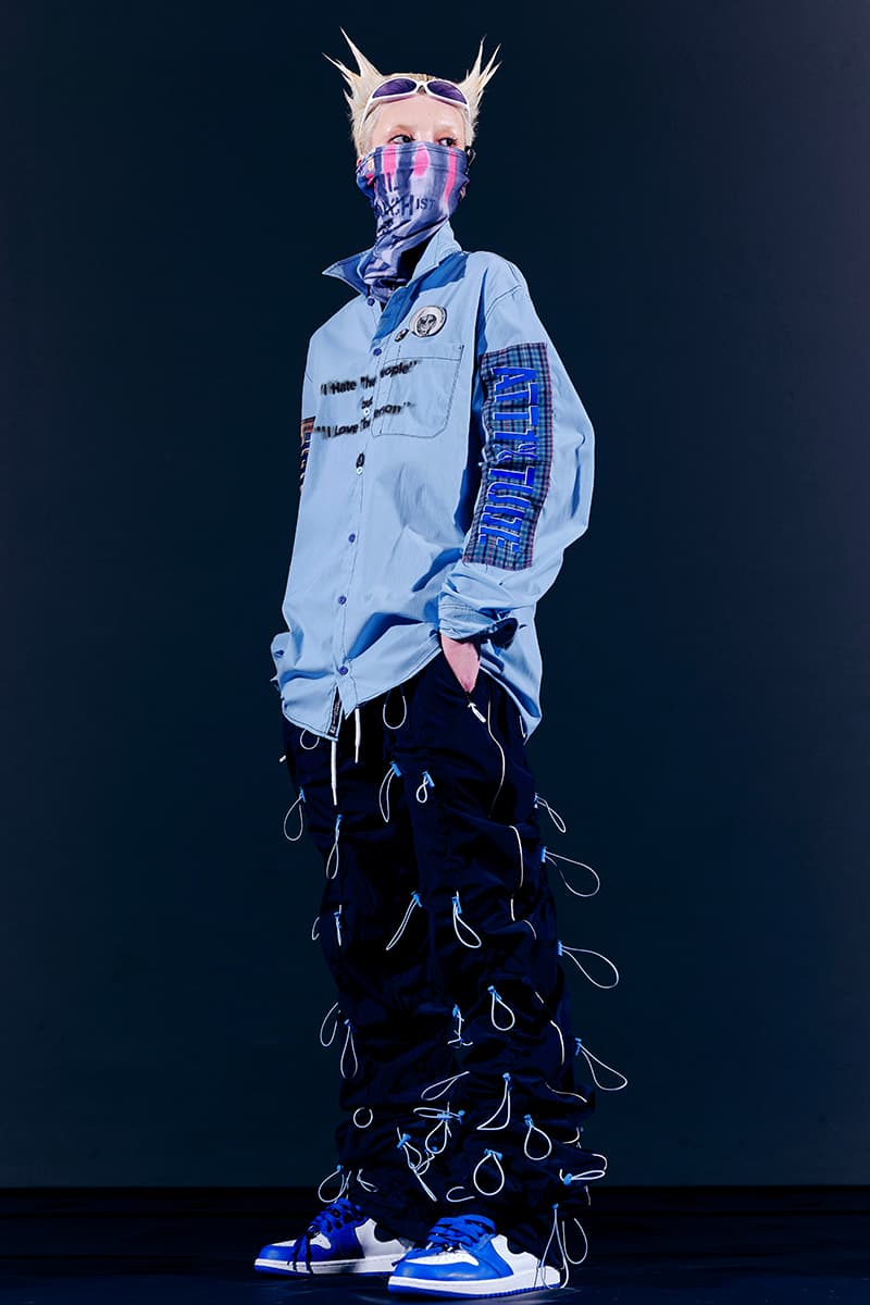 99%IS- "ATT1&TUDE" 15th Collection Lookbook diy maximalism Punk riot gear gobchang pants down puffer jackets glow in the dark reflective inks screenprint bajowoo south korean brand 