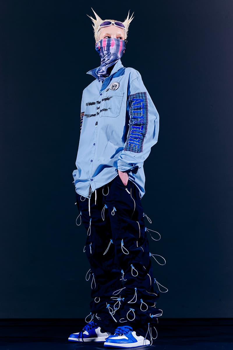 99%IS- "ATT1&TUDE" 15th Collection Lookbook diy maximalism Punk riot gear gobchang pants down puffer jackets glow in the dark reflective inks screenprint bajowoo south korean brand