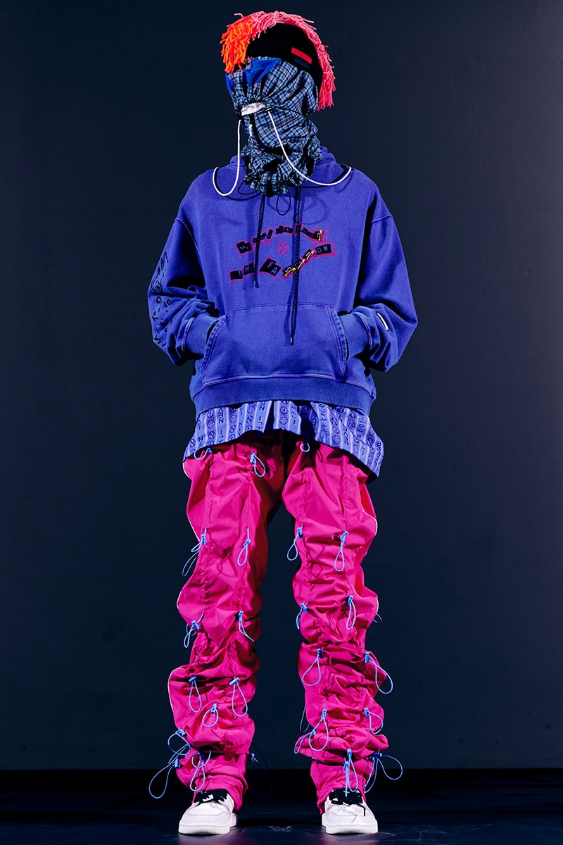 99%IS- "ATT1&TUDE" 15th Collection Lookbook diy maximalism Punk riot gear gobchang pants down puffer jackets glow in the dark reflective inks screenprint bajowoo south korean brand 