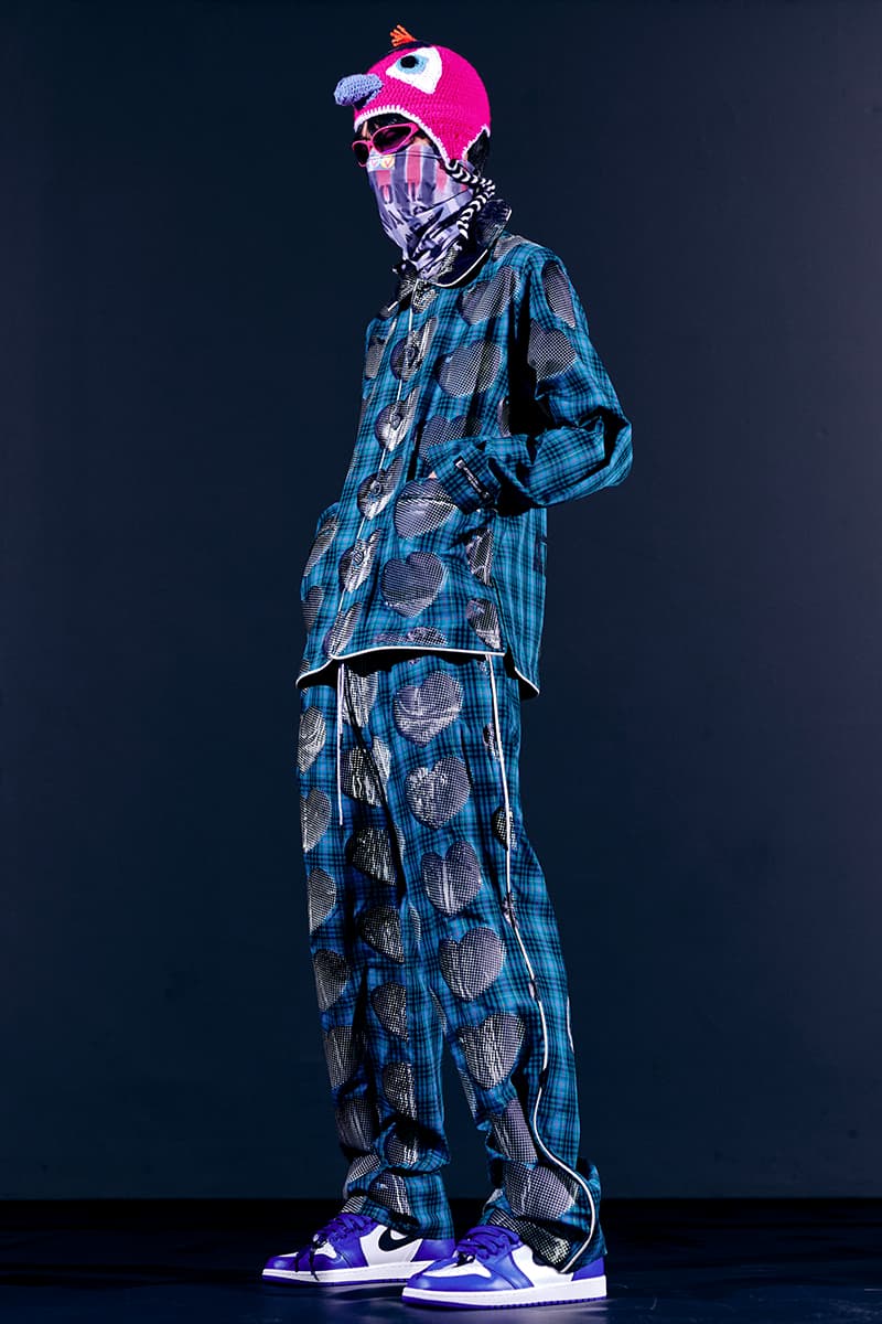 99%IS- "ATT1&TUDE" 15th Collection Lookbook diy maximalism Punk riot gear gobchang pants down puffer jackets glow in the dark reflective inks screenprint bajowoo south korean brand