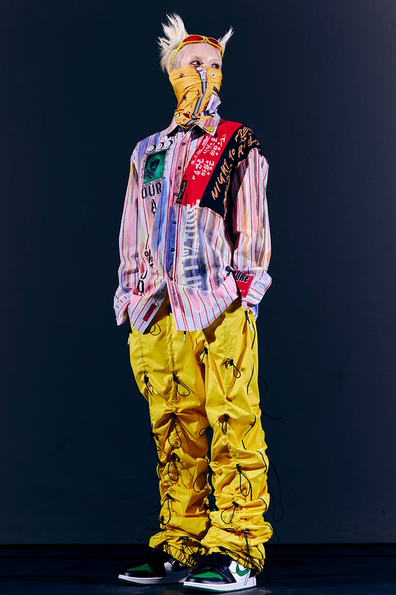 99%IS- "ATT1&TUDE" 15th Collection Lookbook diy maximalism Punk riot gear gobchang pants down puffer jackets glow in the dark reflective inks screenprint bajowoo south korean brand 