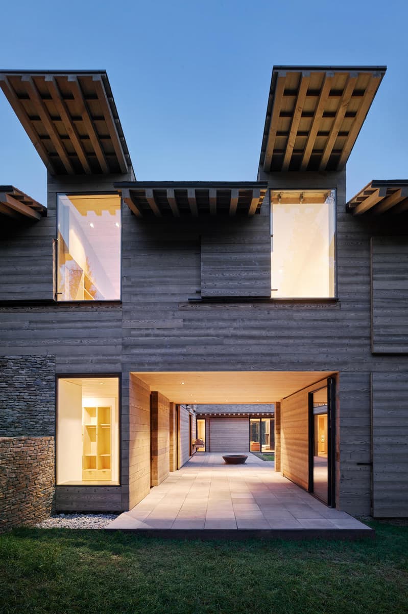 Olson Kundig’s Teton House jackson hole Wyoming pulley shutter transforming wood design interior