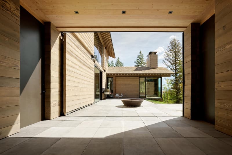 Olson Kundig’s Teton House jackson hole Wyoming pulley shutter transforming wood design interior