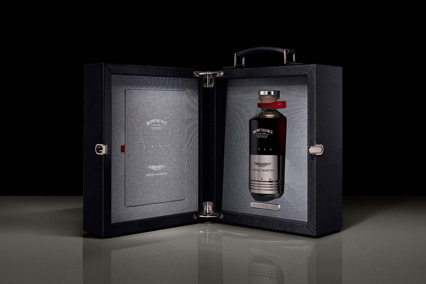 Aston Martin and Bowmore's Ultra-Rare Whiskey Features a DB5 Piston Bottle alcohol supercars British 