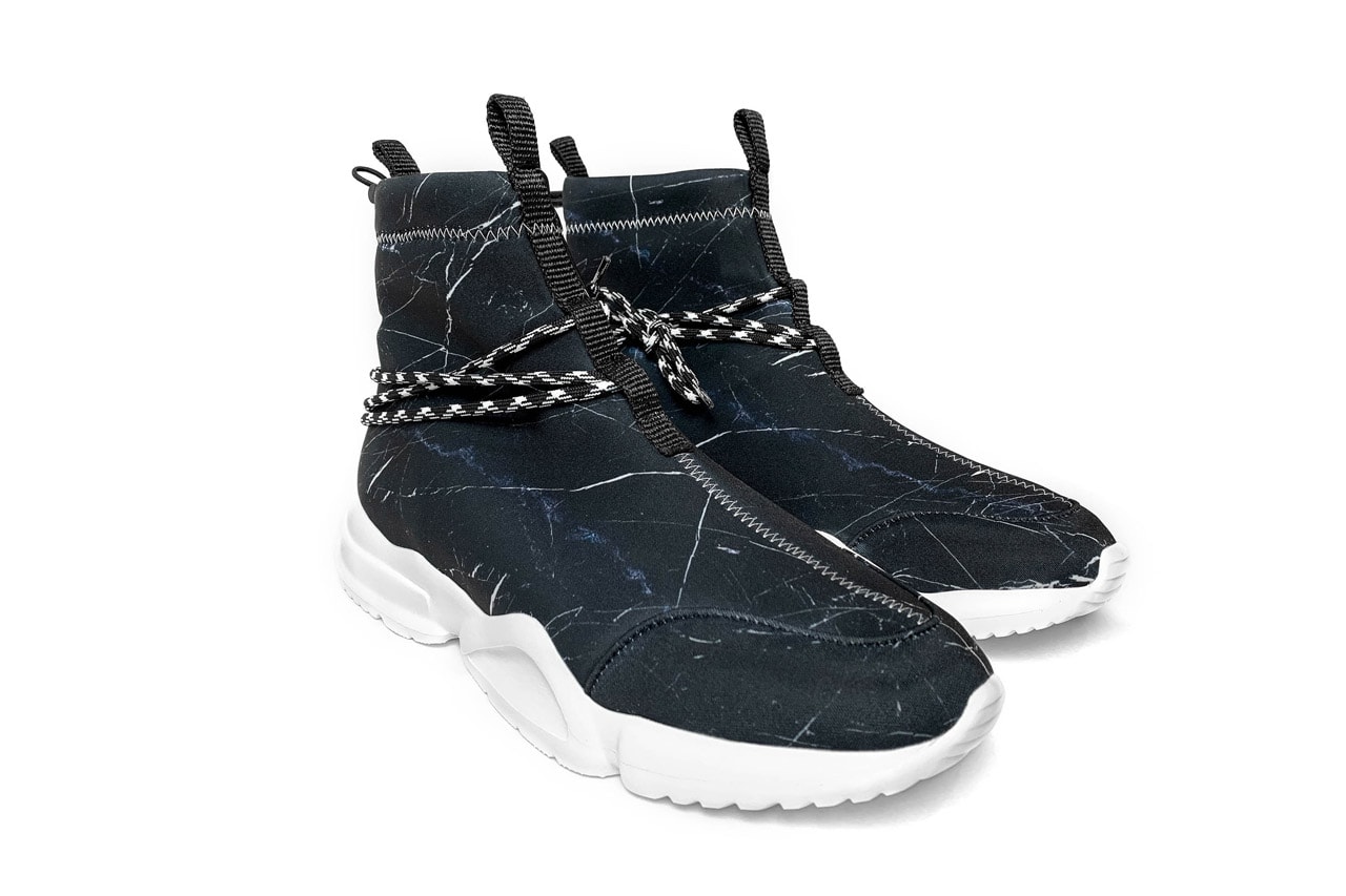 John Geiger Black Marble 002 Sneaker Release stitching white soles blue accents 
