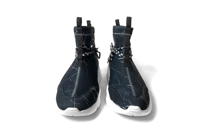 John Geiger Black Marble 002 Sneaker Release stitching white soles blue accents 