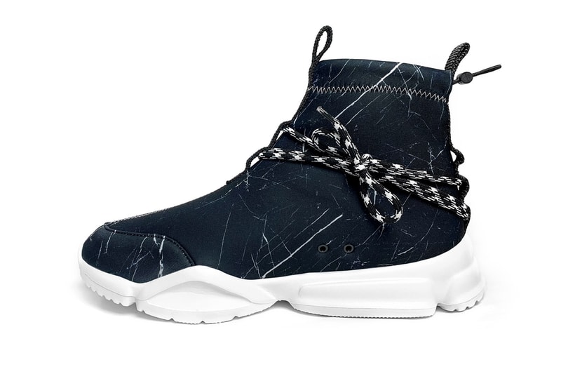 John Geiger Black Marble 002 Sneaker Release stitching white soles blue accents 
