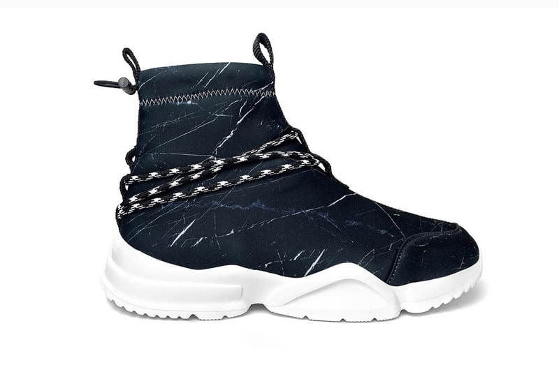 John Geiger Black Marble 002 Sneaker Release stitching white soles blue accents 