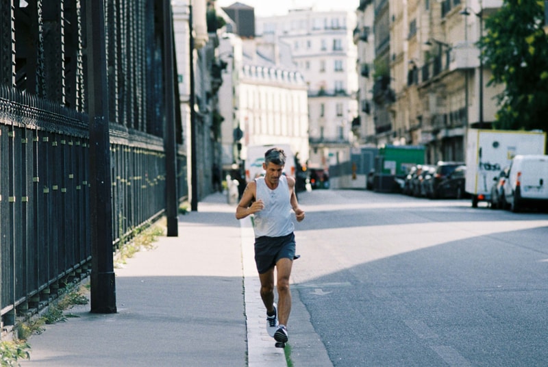 reigning champ asics gel nimbus 22 paris edition running collection singlet shorts t shirt hoodie 1021A516 020 polar shade carrier grey red navy blue Andre Saraiva