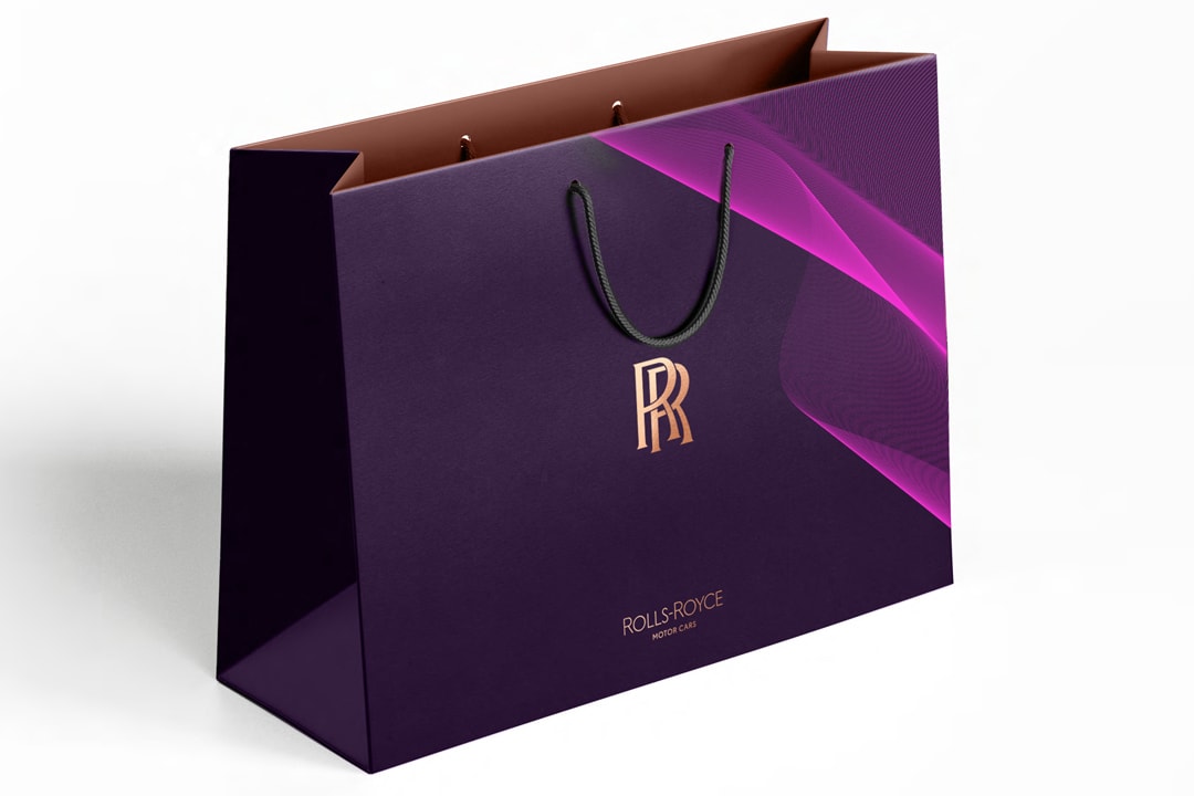 Pentagram Updates Rolls-Royce Brand Identity logo monogram spirit of ecstasy car print design