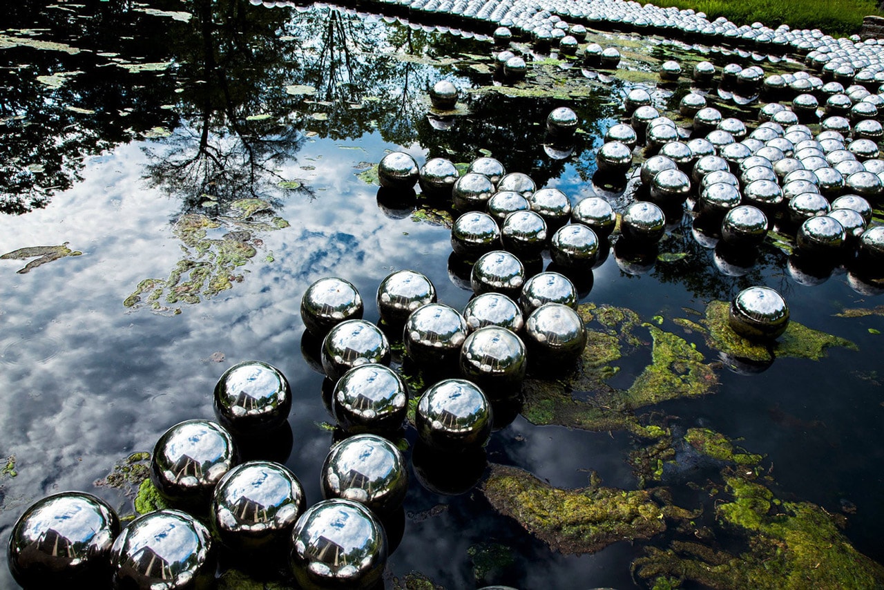 Yayoi Kusama 'Narcissus Garden' in Arkansas installation site-specific mirrored orbs The Momentary industrial setting