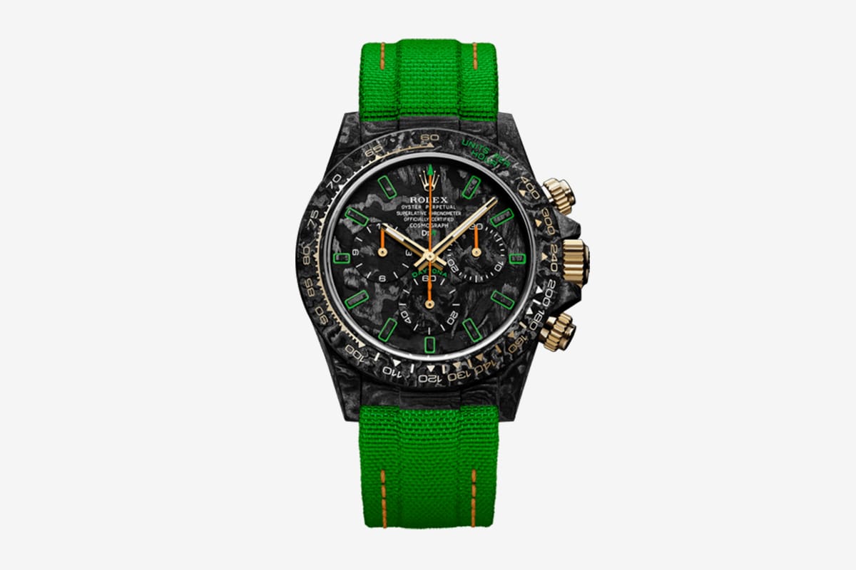 Designa Individual Watches - A tribute to the Daytona Carbon Motley. The  crown, pushers, hands and tachymeter indications are made of 18K Gold. The  technology used to engrave the numbers in the