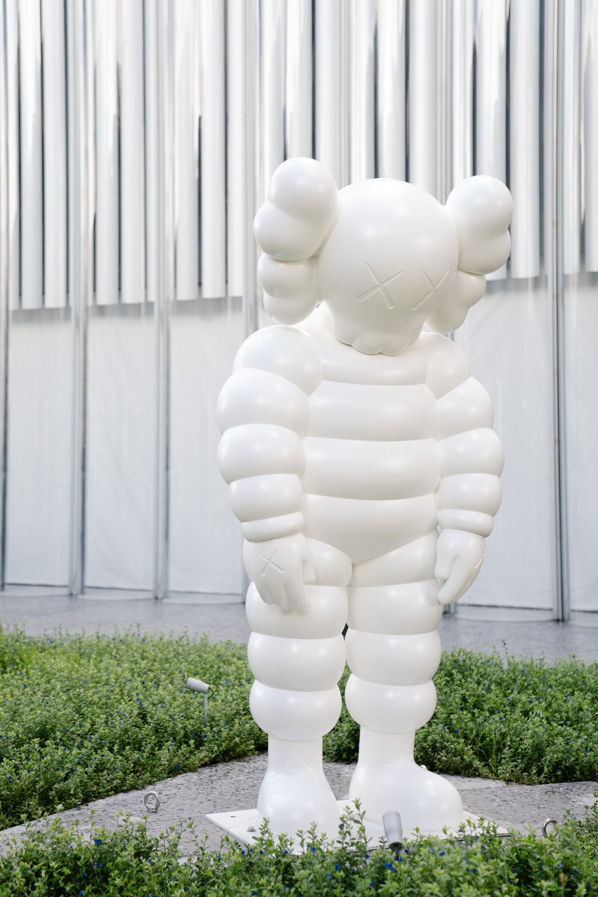 kaws what party installation statue figure sculpture