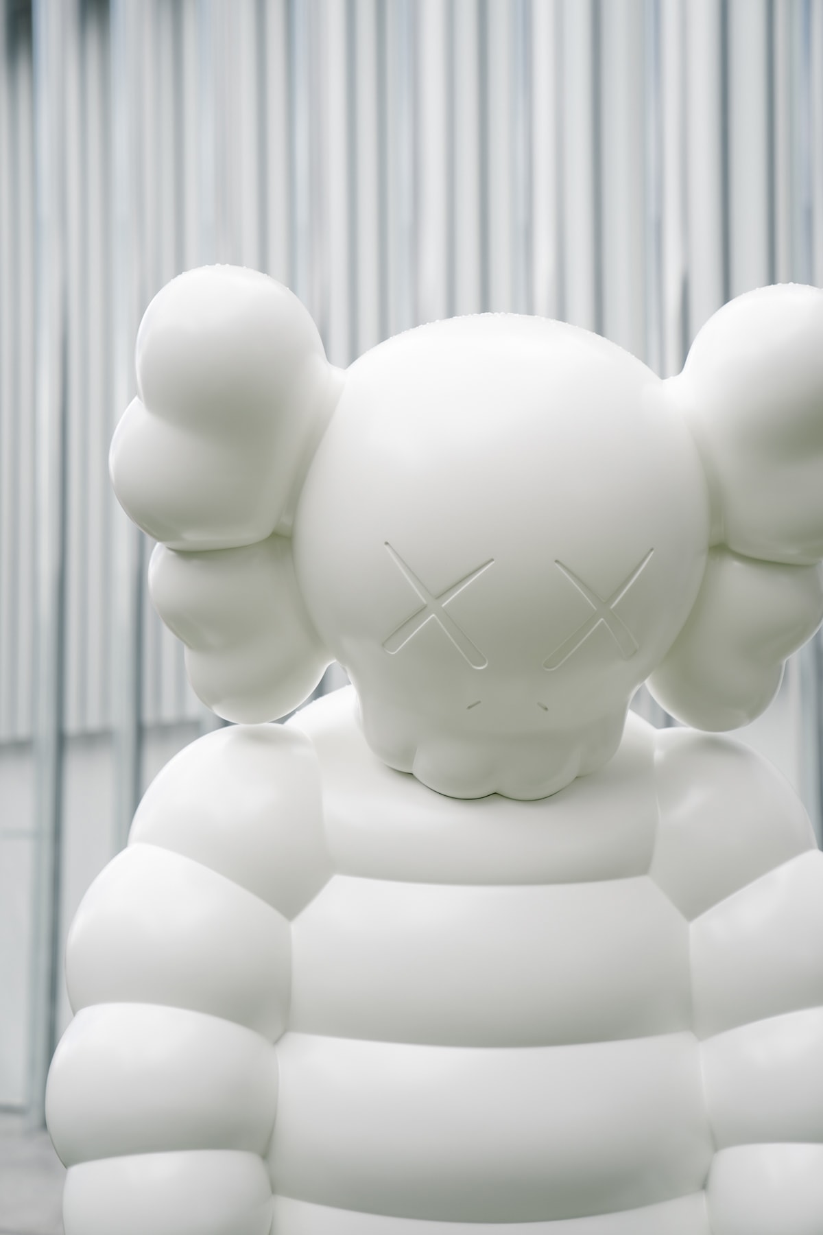 kaws what party installation statue figure sculpture