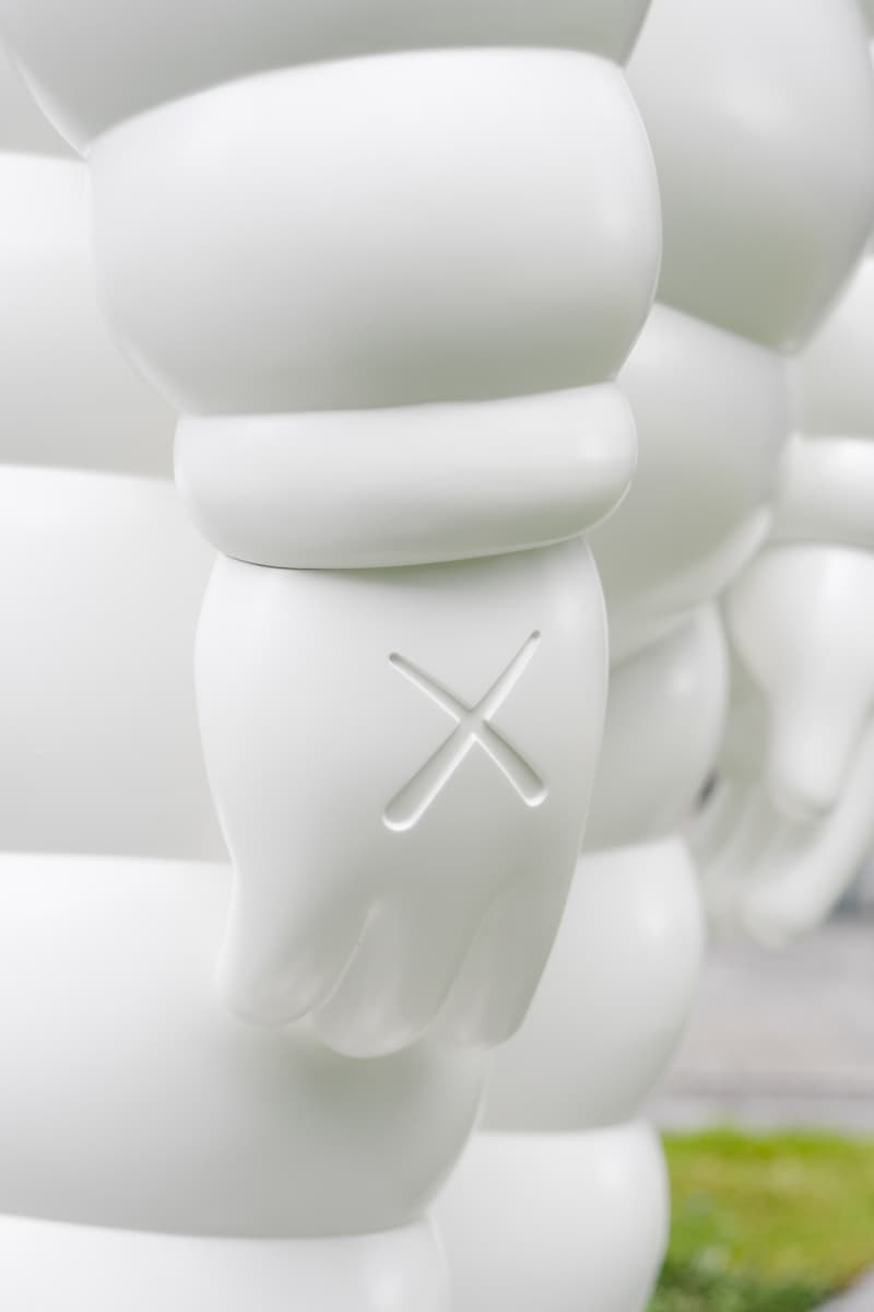 kaws what party installation statue figure sculpture