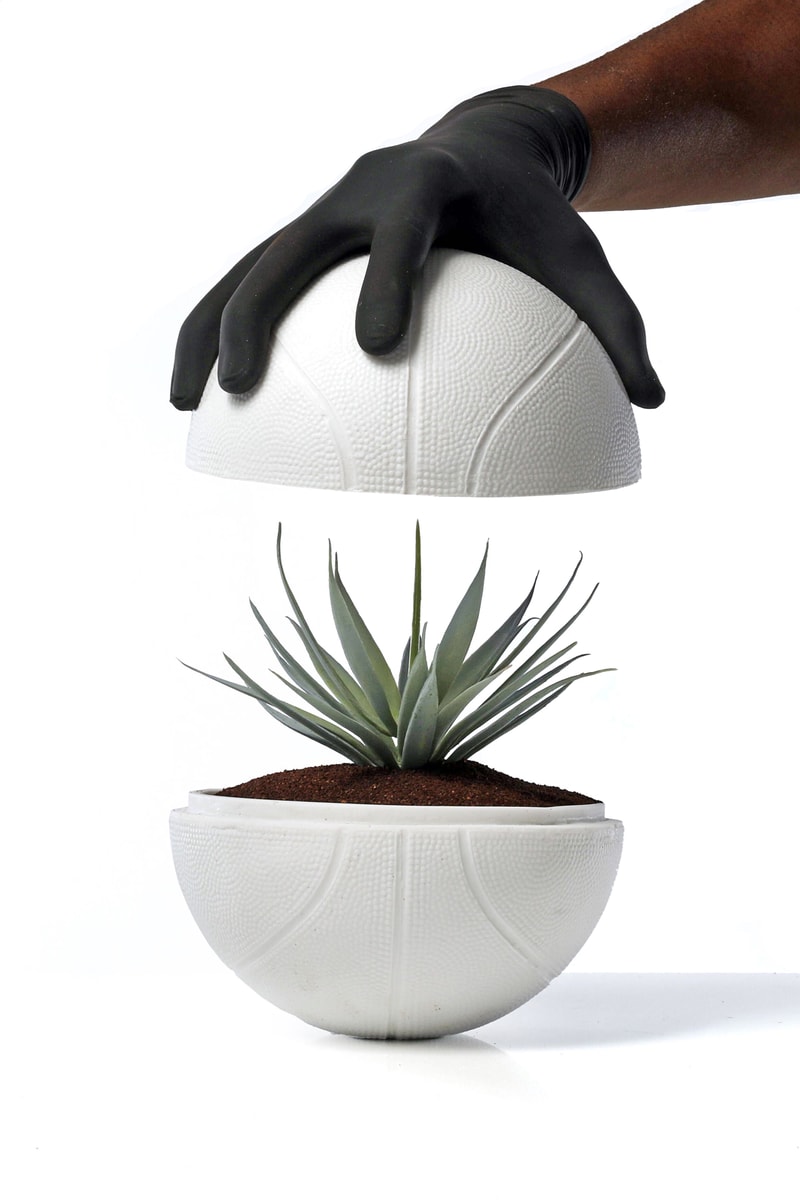 synthetic placement plant bilingual planting instructions in both English and Spanish, a certificate of authenticity custom designed protective housing encasement Tequila Don Julio 1942 packaging NBA creative community agave planter