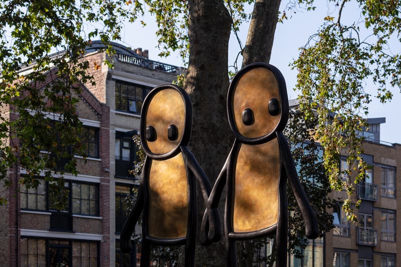 stik holding hands public sculpture london united kingdom artworks