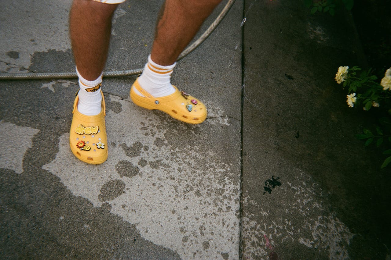 yellow crocs on feet