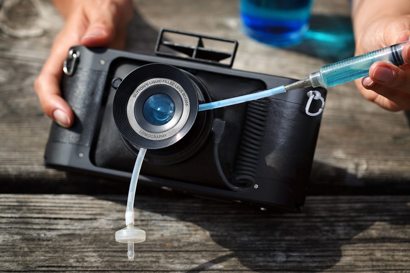 Lomography HydroChrome Suttons Panoramic Belair Camera technology liquid filled lens lza sproket holes 