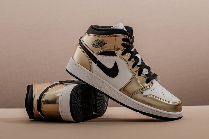 gold and black jordan 1