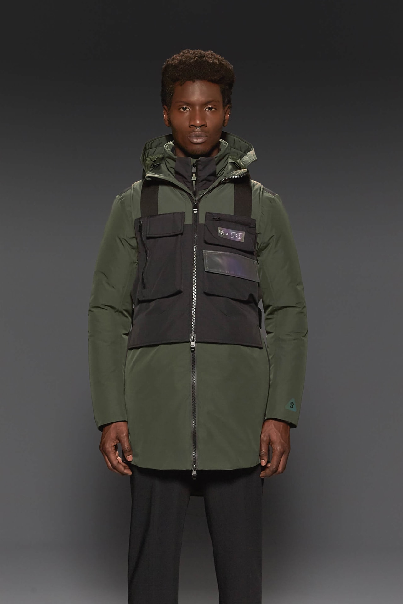 Serge Ibaka design parka, anorak, bomber jacket, vests, hats and scarves, patented membrane lamination, seam-sealed construction, Canadian origin white duck down, Reflective trims, iridescent logos, water repellent nylon shell, Fall/Winter season, big scarf energy
